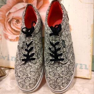 Black and grey floral vans